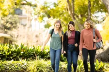 Three students walking