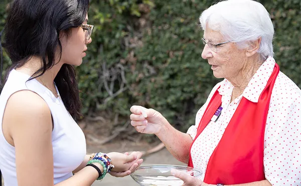 A student receiving communion.
