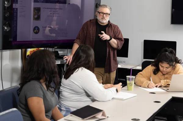 professor teaching in hollywood classroom