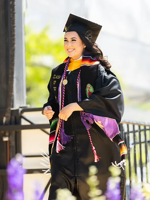 Student receiving her diploma at MSMU Commencement 2022