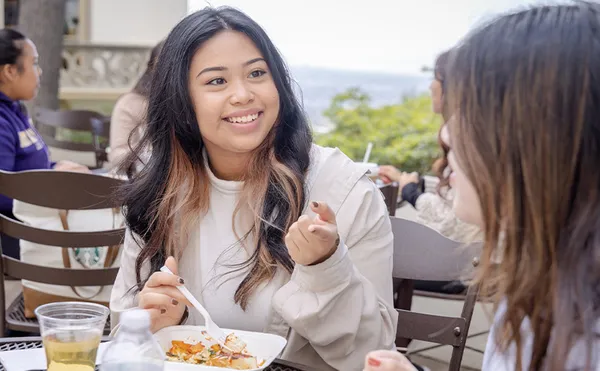Two students eating lunch outside