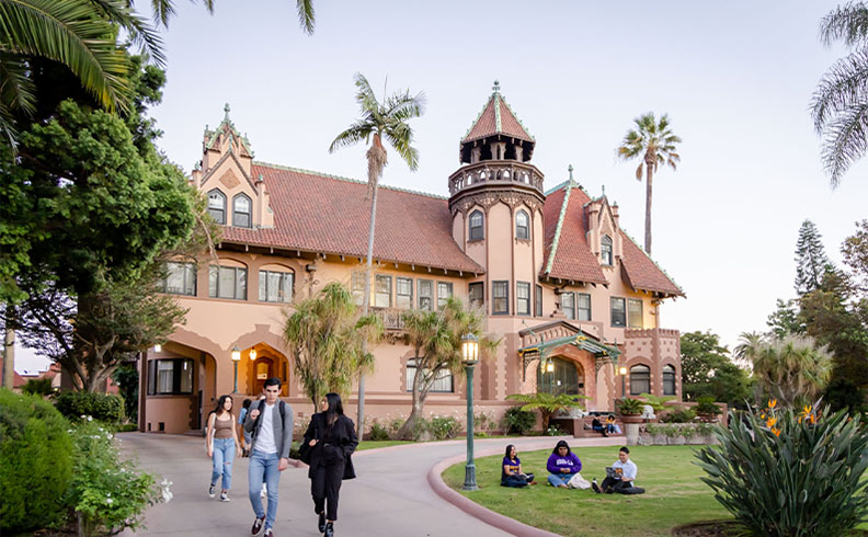 Students walking passed the Mansion on MSMU's Doheny Campus