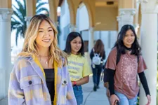 Student looking at the camera and students walking at the Chalon Campus.