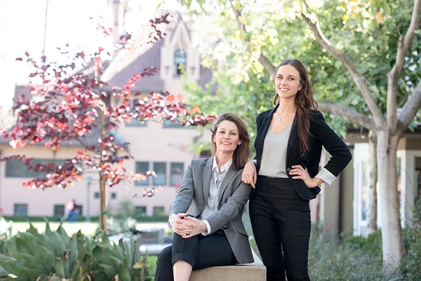 Two women in business attire