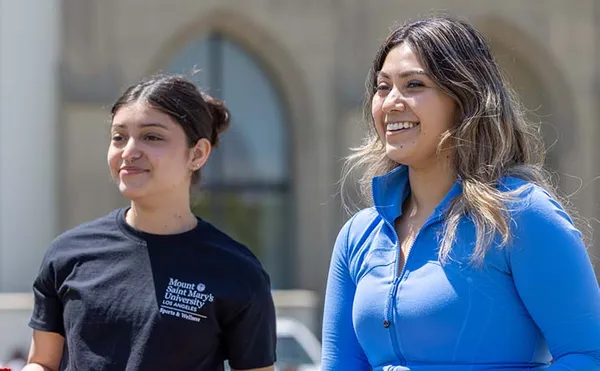 two students smiling