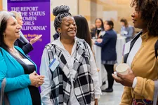 Women talking at a meet and greet event